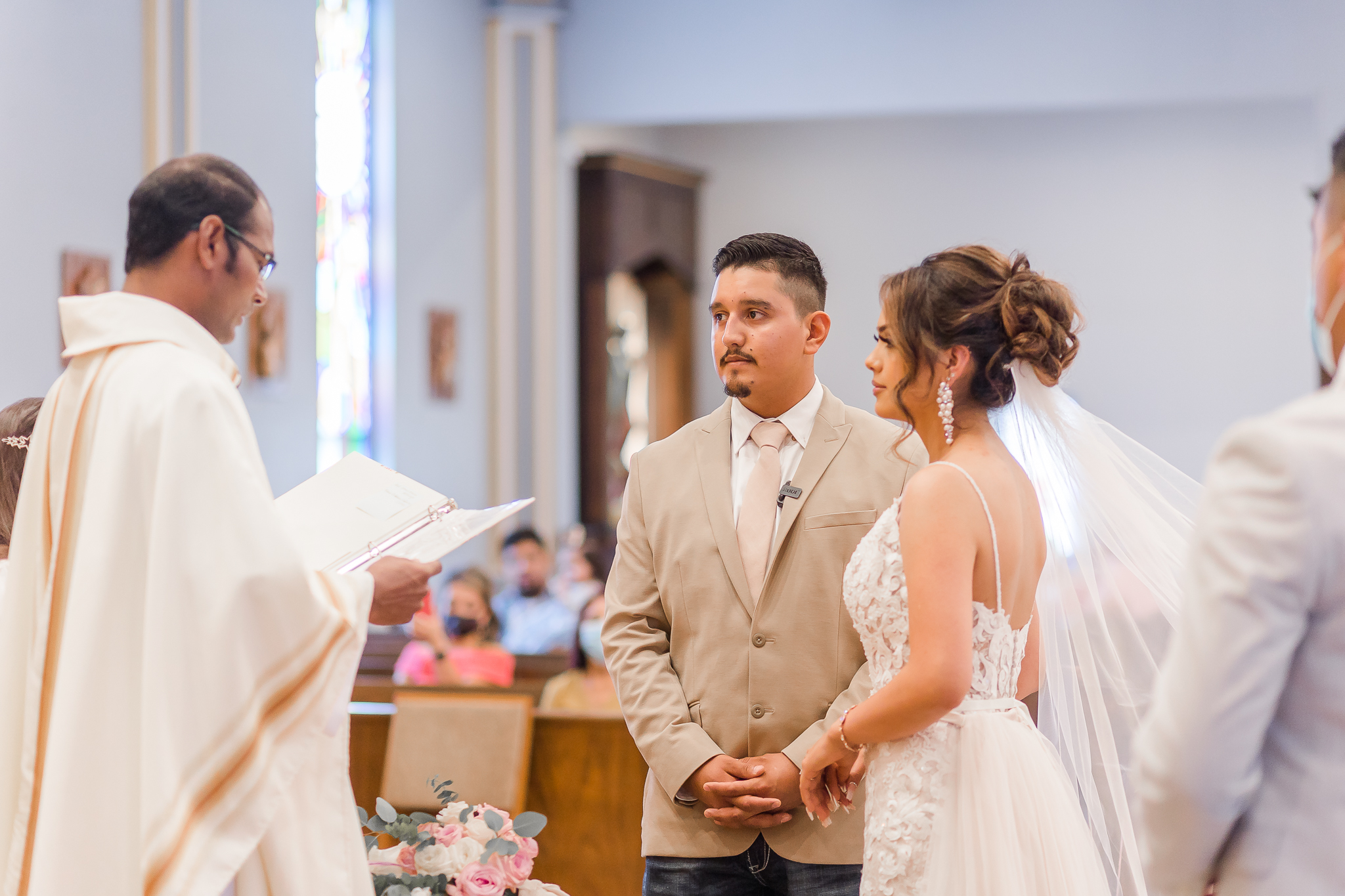 kneeling, catholic wedding, catholic ceremony, west TX summer wedding