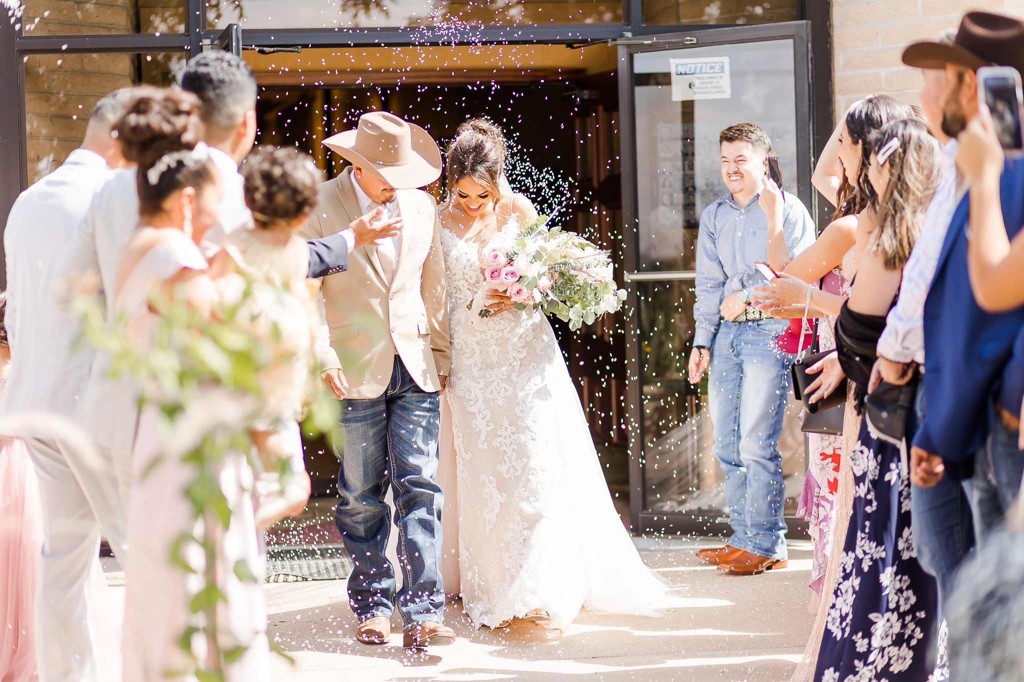 rice exit, grand exit, west TX summer wedding, dallas wedding photographer, couple smiling, just married 