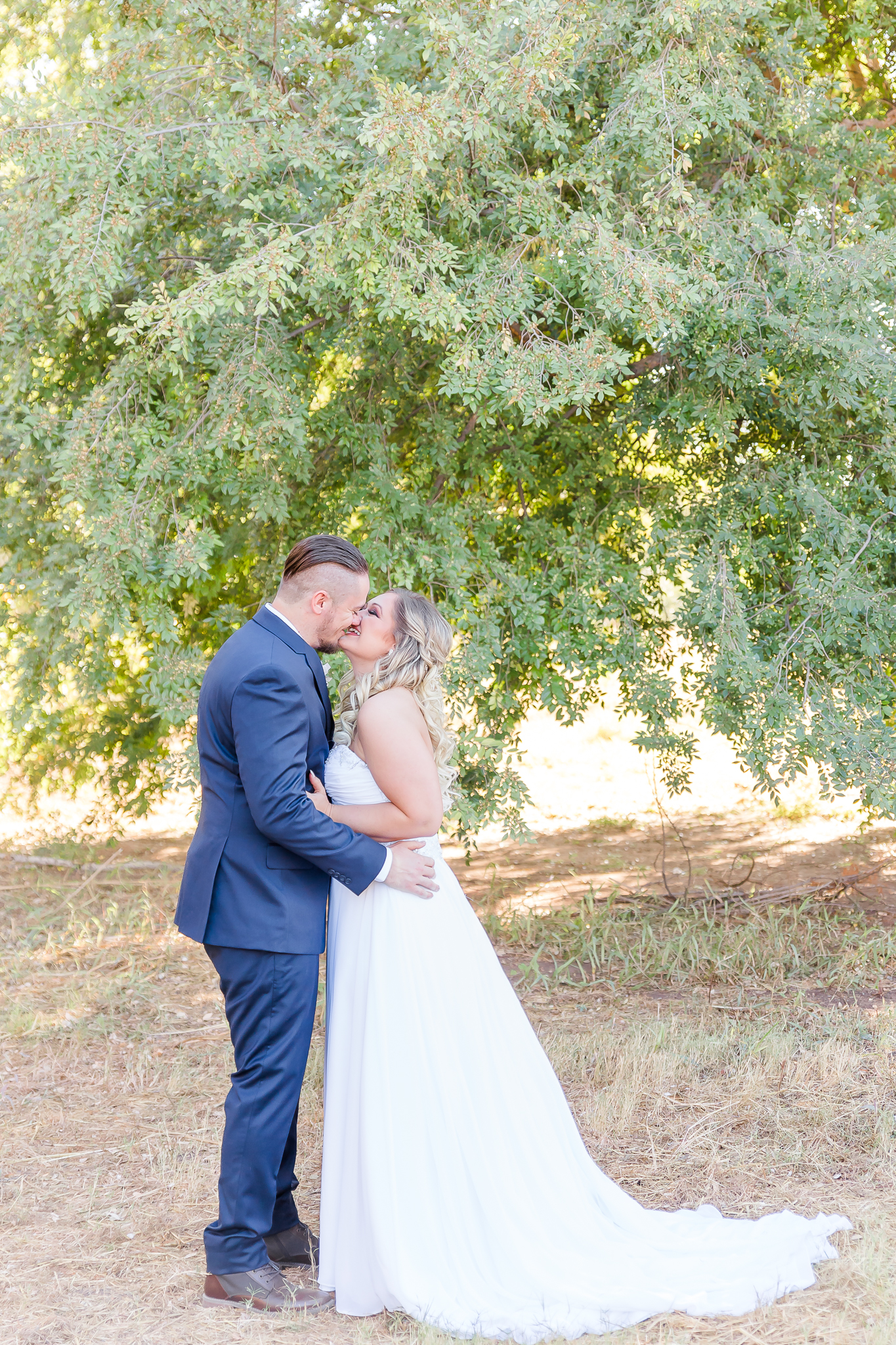 bride and groom kissing, dallas wedding photographer, first look, texas wedding